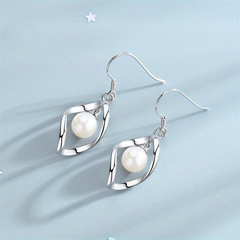 Duo de Boucles d'Oreilles "Nacre Torsadée"